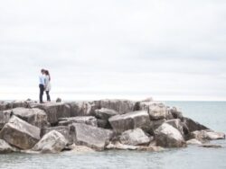 Couple in the future on rocks