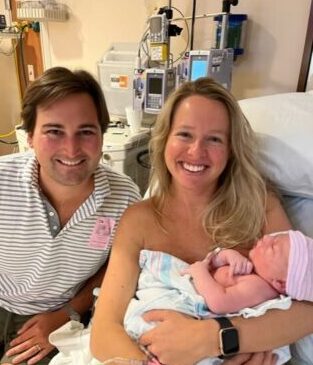 Grayson and his parents in the hospital